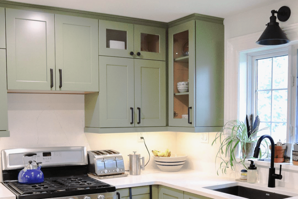 mossy light green kitchen cabients