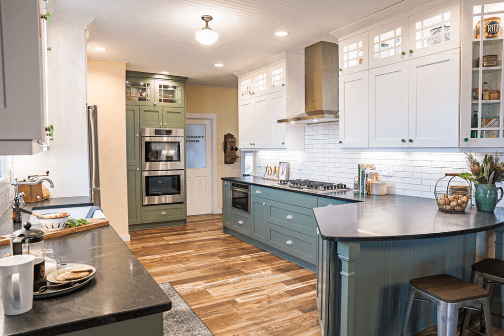 two tone green and white kitchen cabinets