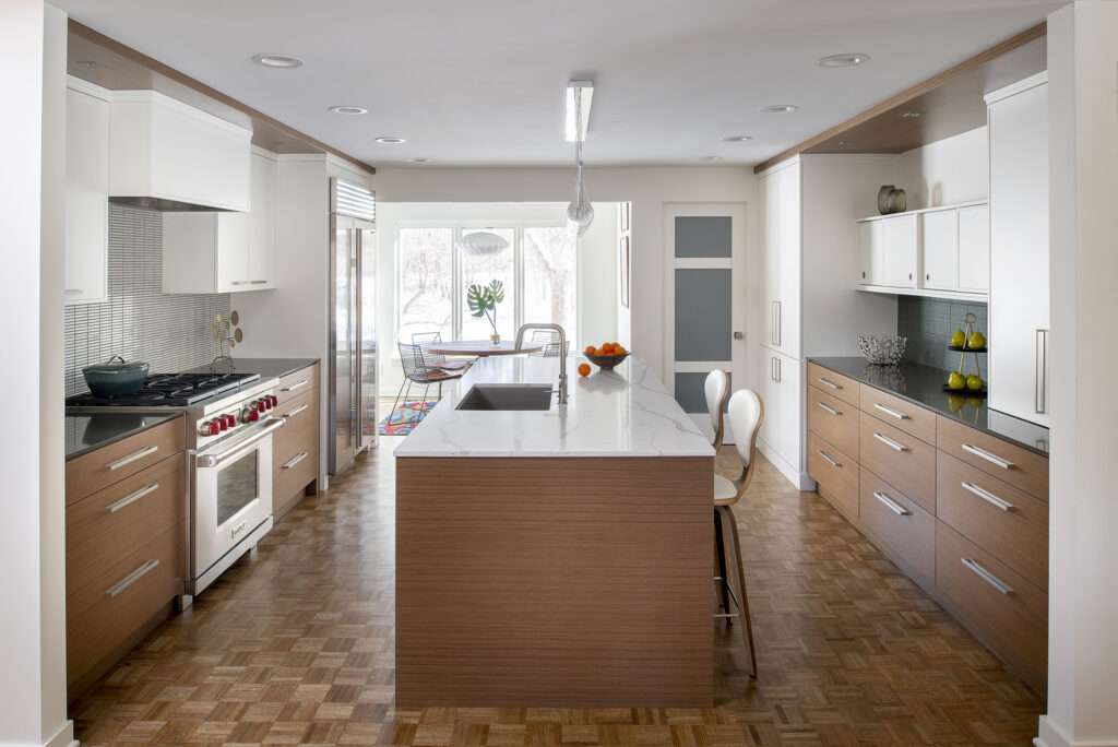 two tone flat panel walnut kitchen cabinets