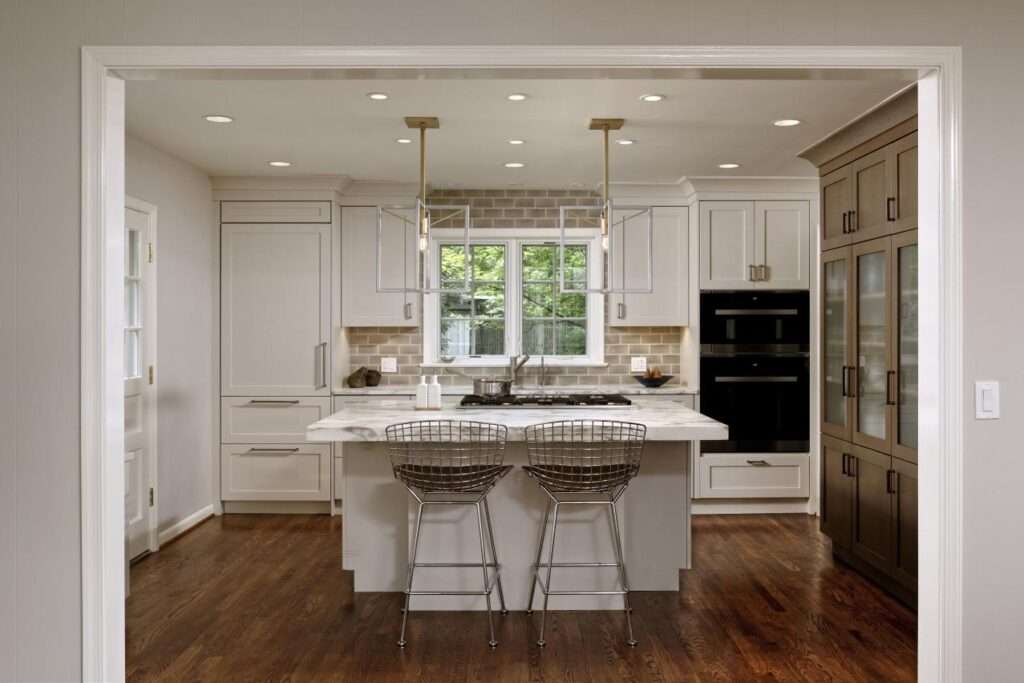 white kitchen with wood china cabinet